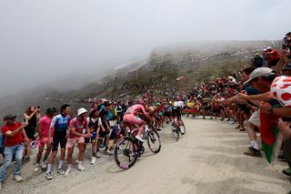 UAE Team Emirates XRG's Mexican rider Isaac Del Toro wearing the pink jersey of overall leader (Maglia Rosa) rides on the ascent of the Colle Delle Finestre during the 20th stage of the 108th Giro d'Italia cycling race 205kms from Verres to Sestriere on May 31, 2025. (Photo by Luca Bettini / AFP)
