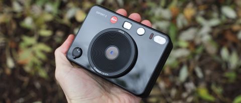 Leica Sofort 2 hybrid camera held in a hand