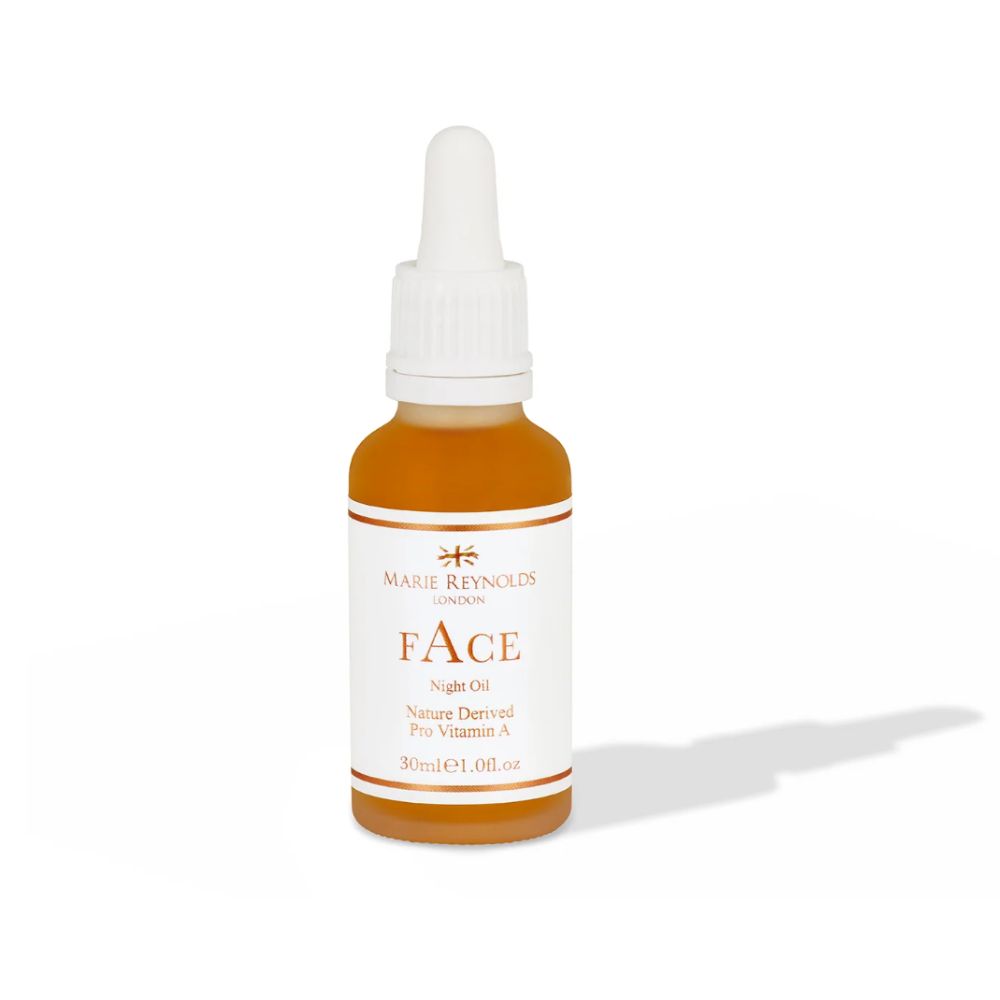 Orange bottle of Marie Reynolds face oil with dropper lid