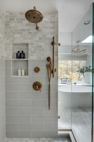 grey bathroom with subway tiles by Erika Jayne Design