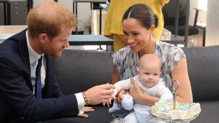 Prince Harry and Meghan with Prince Archie as they meet with Archbishop Desmond Tutu