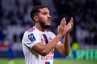 Rayan Cherki of Lyon thanks supporters for standing during the Ligue 1 Uber Eats match between Olympique Lyonnais and ESTAC Troyes at Groupama Stadium on August 19, 2022 in Lyon, France.
