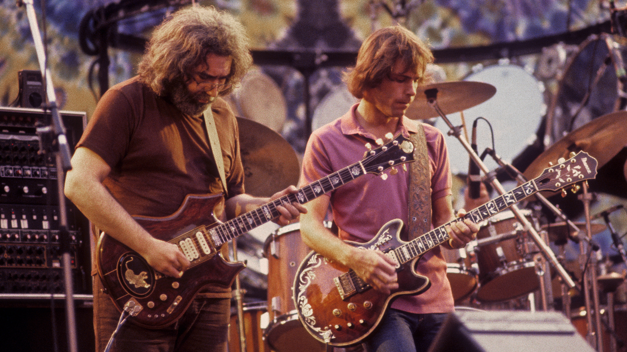 Jerry Garcia and Bob Weir performing with the Grateful Dead at the Greek Theater in Berkeley on September 13, 1981. Bob Weir plays an Ibanez guitar.