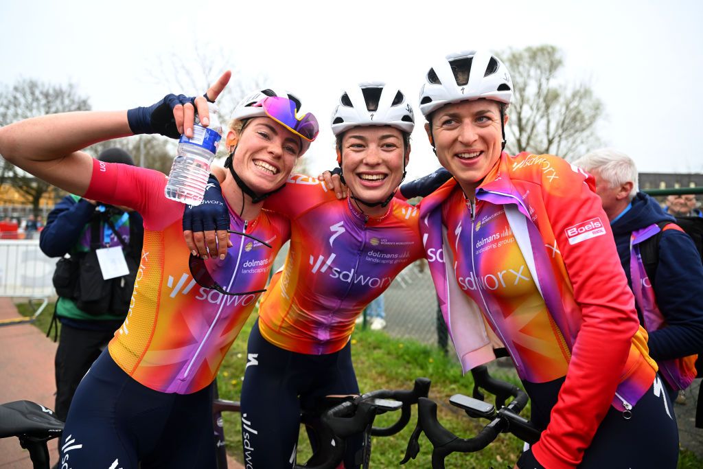 WAREGSD Worx teammates Demi Vollering, Marlen Reusser and Mischa Bredewold at Dwars door VlaanderenEM BELGIUM MARCH 29 Race winner Demi Vollering of The Netherlands and Team SD Worx celebrates with her teammates Mischa Bredewold of The Netherlands and Marlen Reusser of Switzerland and Team SD Worx after the 11th Dwars door Vlaanderen 2023 Womens Elite a 1149km ine day race from Waregem to Waregem DDV23 on March 29 2023 in Waregem Belgium Photo by Luc ClaessenGetty Images