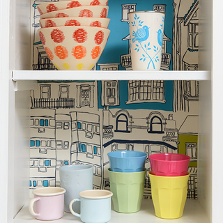 kitchen with cupboard and bowls cup in cupboard