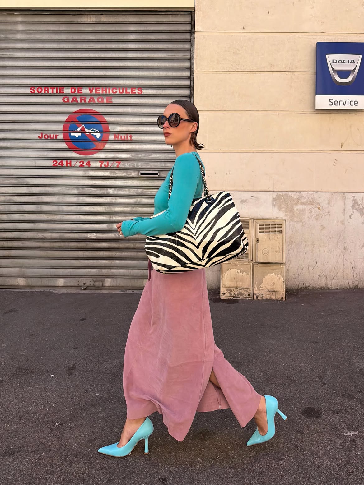 Lara wearing zebra print bag