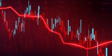 stock market chart showing red and green candlesticks but a general downtrend