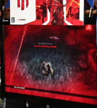 The Gamer's University booth at Comic-Con had 8-player death matches every hour during the show. Here's a glimpse of the red screen of death in UT3.