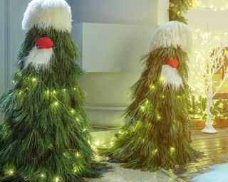 Christmas trees decorated as Santas