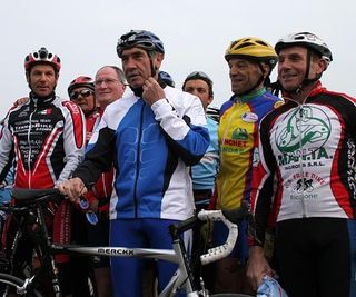 Eddy Merckx riding with friends