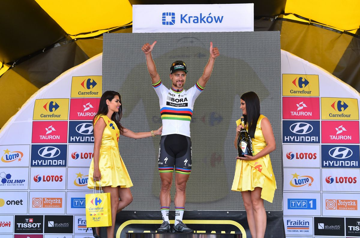 Peter Sagan on the podium about to collect the yellow jersey