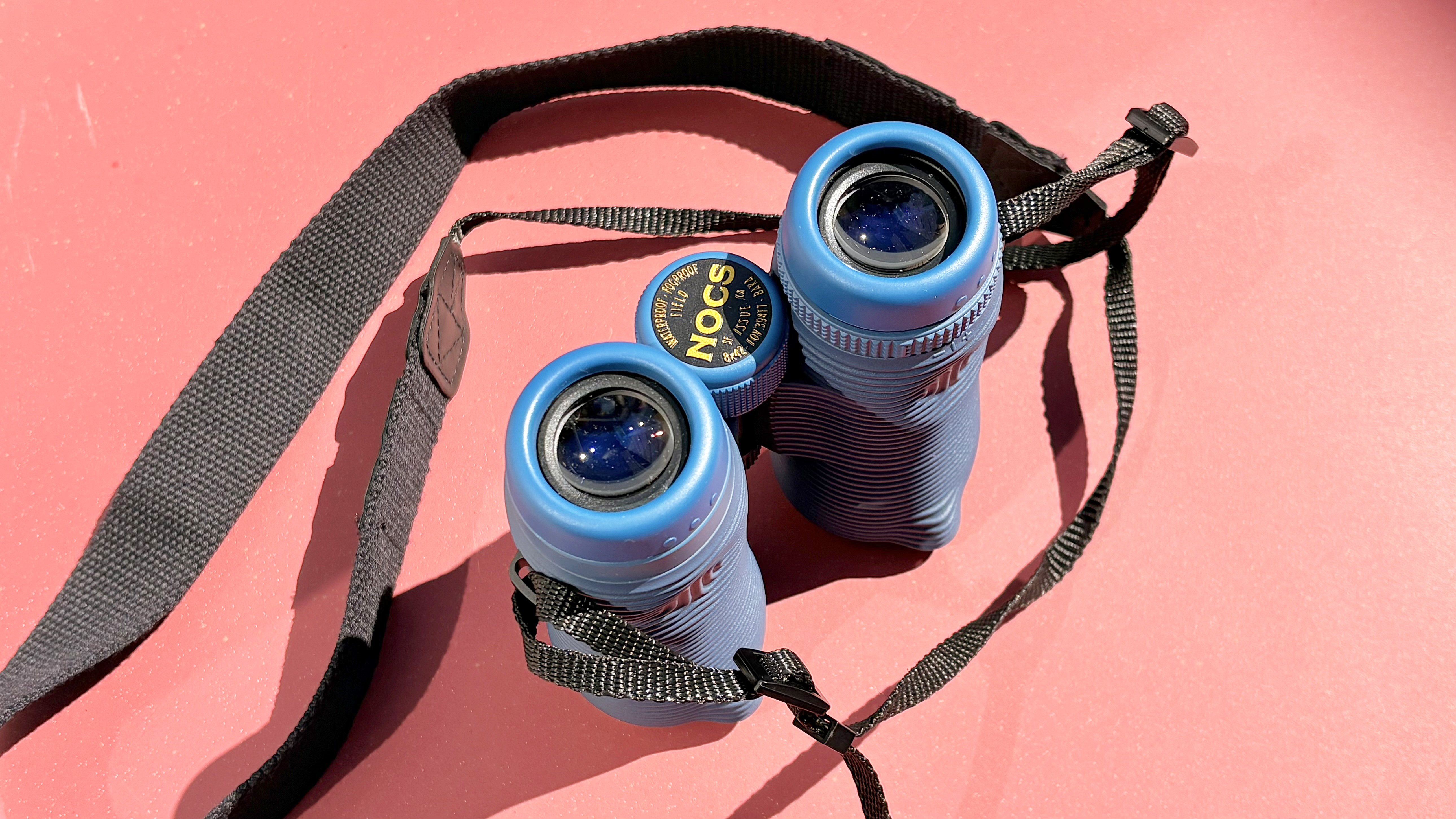 Close-up of the Nocs Field Issue 42 binoculars in blue