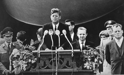 President John F. Kennedy delivers his speech "I am a Berliner" in front of the city hall in West Berlin.