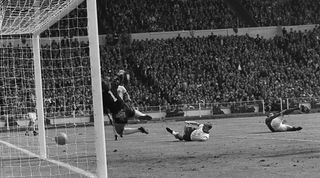 30 Jul 1966: World Cup Final, England v West Germany (4-2 aet). Second in a sequence showing England's controversial third, Hurst's second, goal.