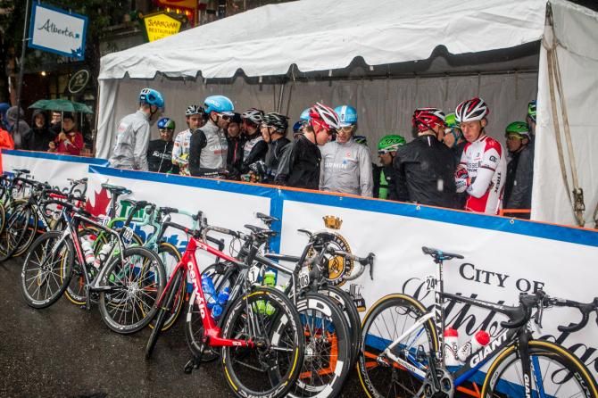 Riders hid under cover for as long as they could before the stage
