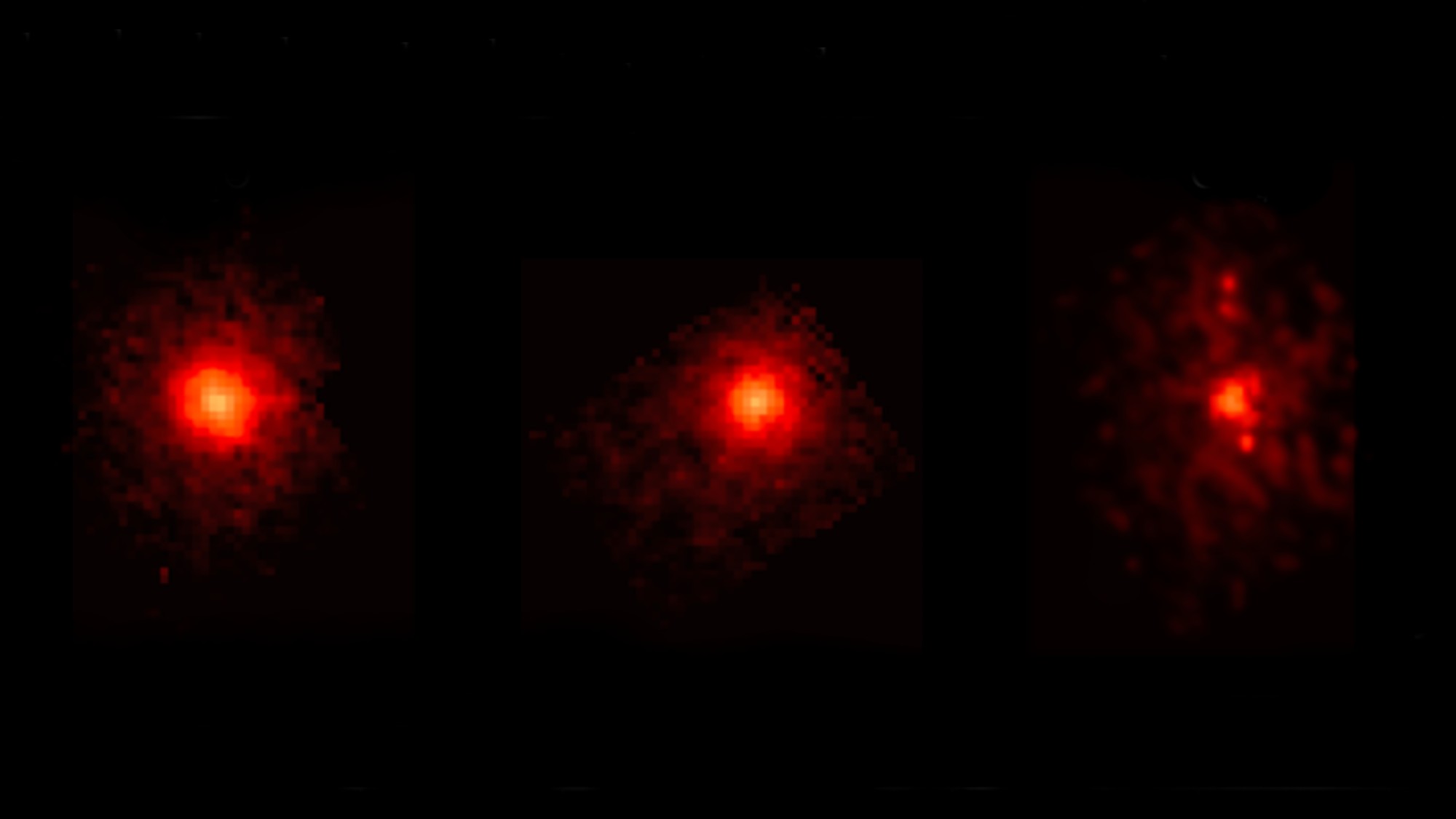 three blurry red splotches on a black background