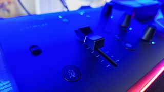 Yamaha ZG02 review image showing the singular fader on the mixer's face