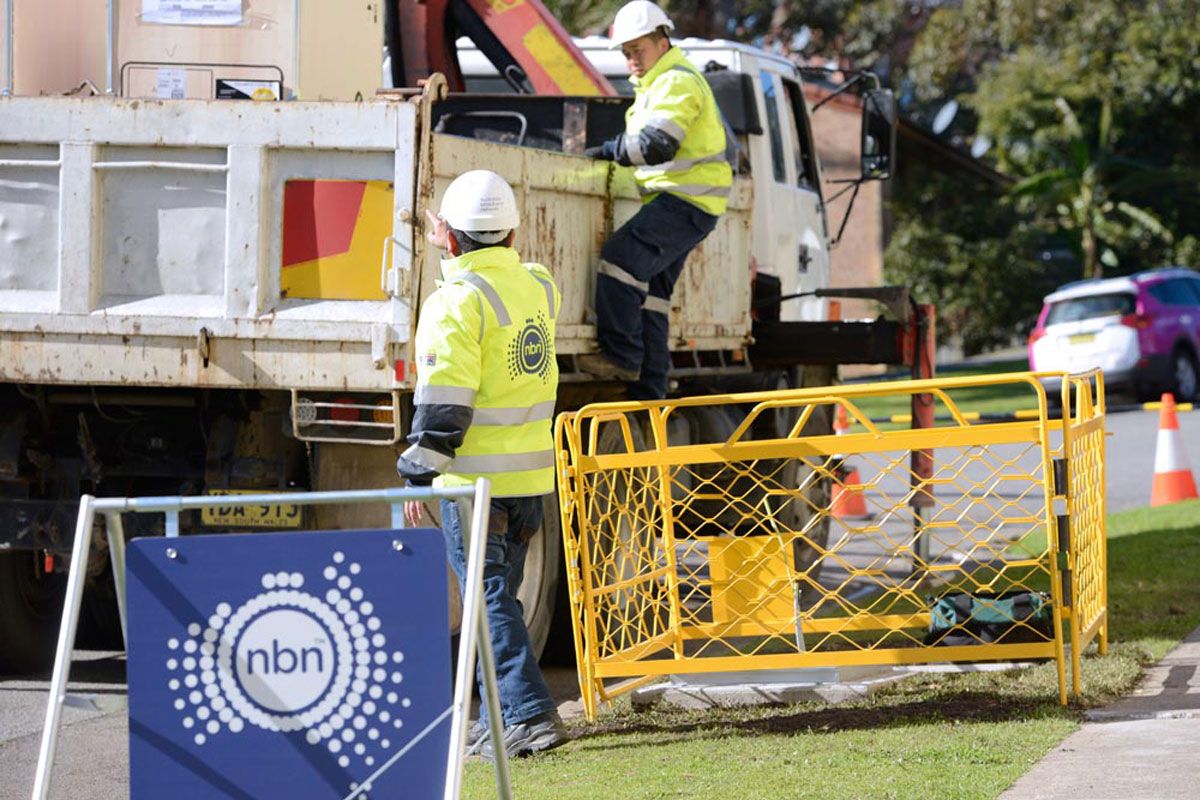 NBN workers installing new infrastructure in street