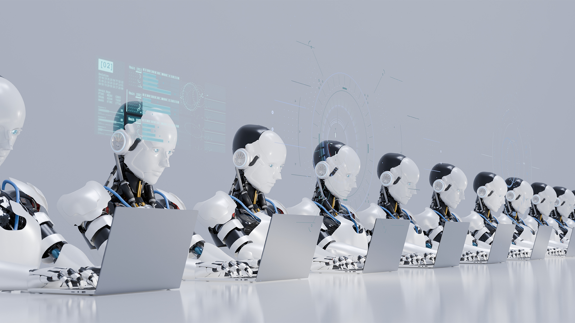 Automation concept image showing a row of robots working on laptops.