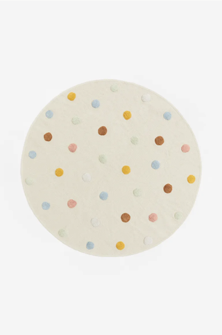 Cotton rug with tufted colorful dots from H&M Home.