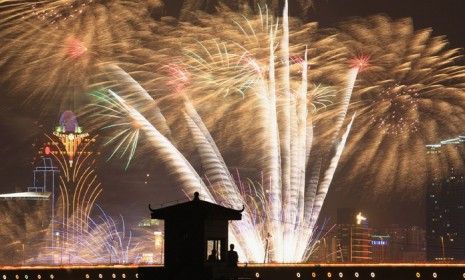 Fireworks explode to celebrate the Mid-Autumn Moon Festival on September 12, 2011 in Macau, China.