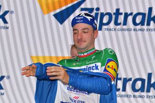 Elia Viviani is in the blue jersey for stage 3