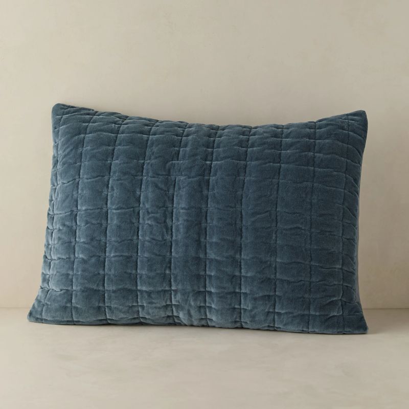 blue quilted cushion