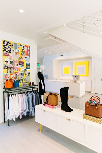 Room, Interior design, Ceiling, Clothes hanger, Floor, Interior design, Light fixture, Hall, Outlet store, Linens,