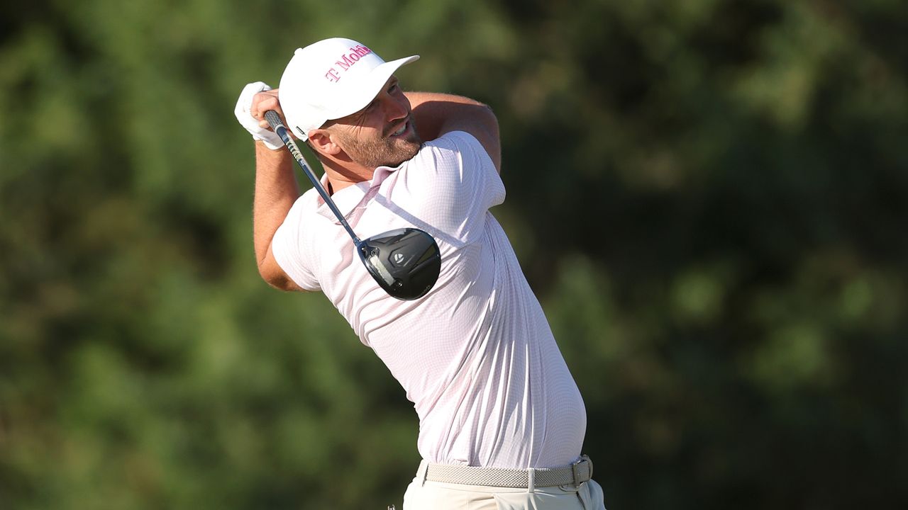 Wyndham Clark hits a driver off the tee