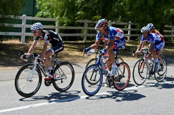 Oscar Pujol leads George Hincapie in the day's long break.