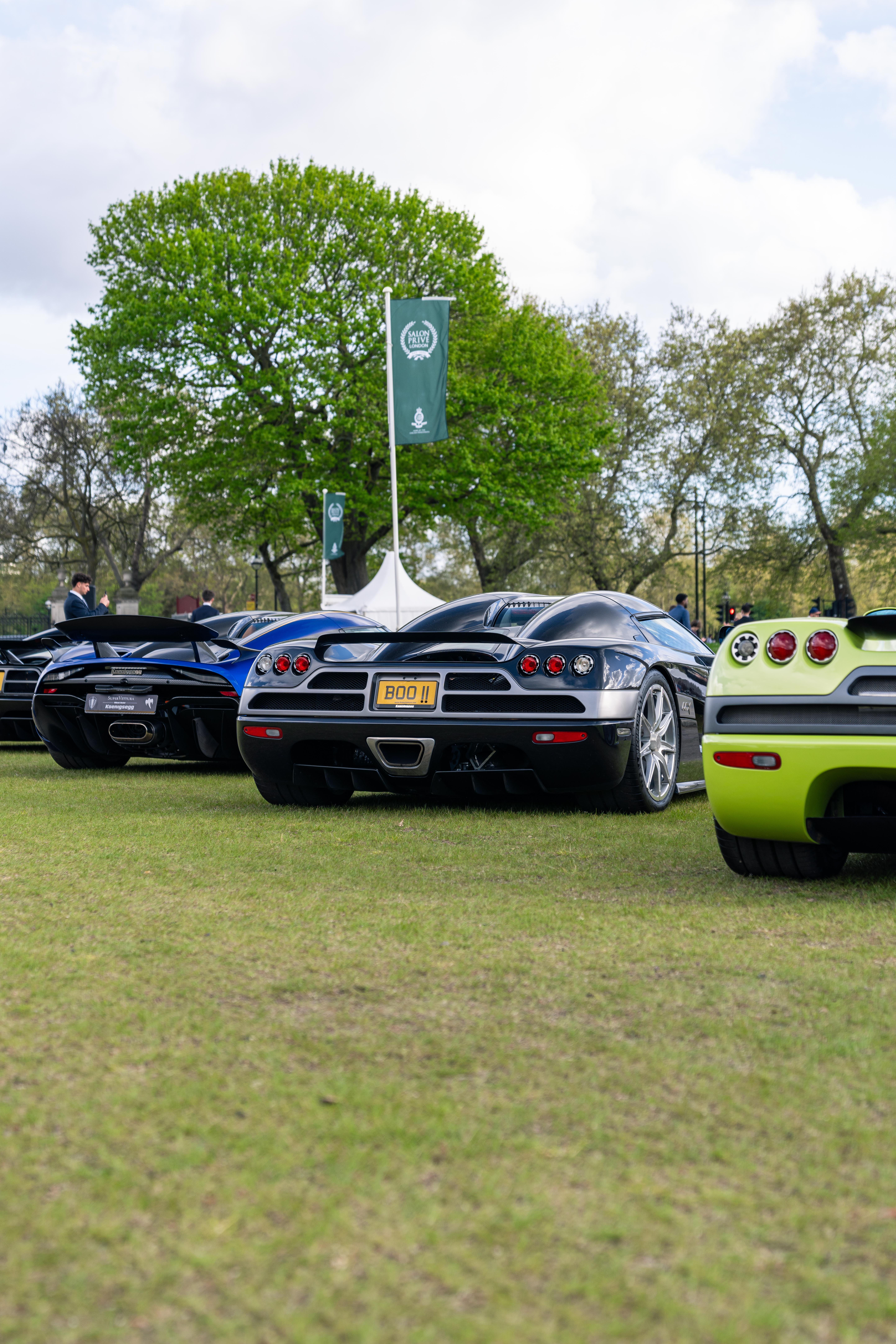 A row of Koenigseggs viewed from behind