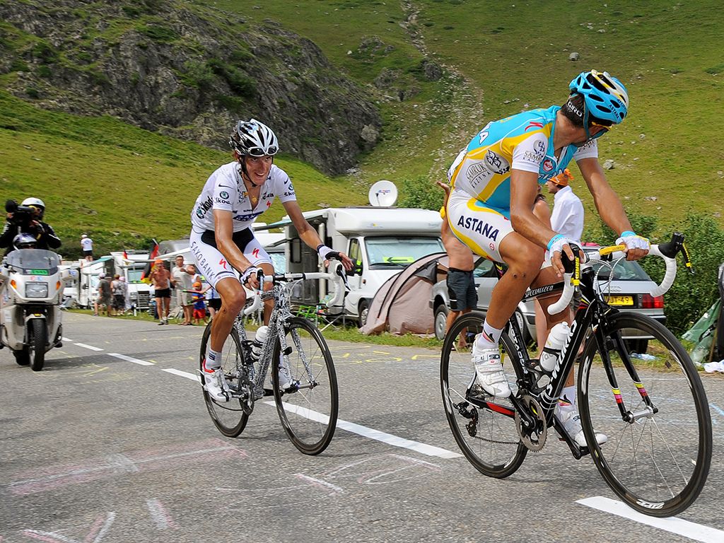 Andy Schleck holds Contador's wheel on the Col de la Madeleine