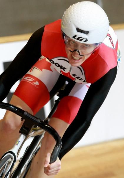 Tara Whitten attacks the banking in the flying lap tt in the women's Omnium