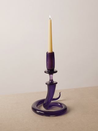 a purple snake candlestick