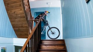 Mountain biker riding through a house at Red Bull Valparaíso Cerro Abajo