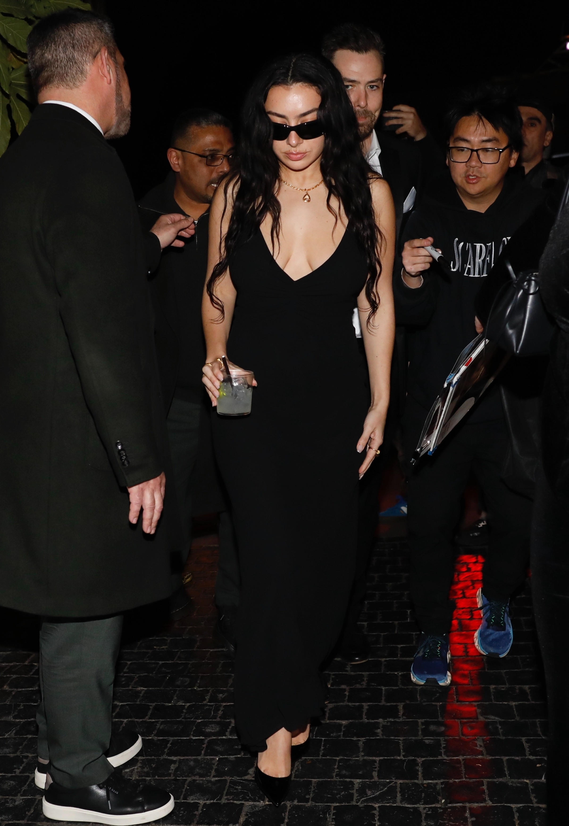 Charli xcx attended a Wuthering Heights after party in a plunging little black dress
