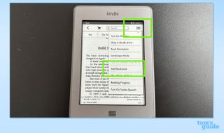 Kindle open at a page showing the drop-down options menu