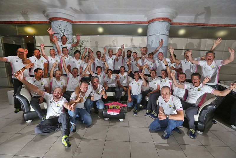 The full Tinkoff-Saxo team celebrate with the pink jersey