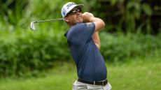 Andy Ogletree of the United States tees off on hole 5 during the first round of the Hong Kong Open 