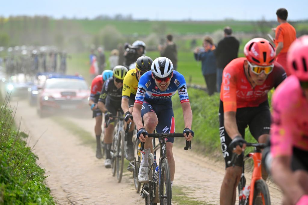 ROUBAIX FRANCE APRIL 07 Kasper Asgreen of Denmark and Team Soudal QuickStep competes passing through the Capelle Ruesnes cobblestones sector during the 121st ParisRoubaix 2024 a 2597km one day race from Compiegne to Roubaix UCIWT on April 07 2024 in Roubaix France Photo by Luc ClaessenGetty Images