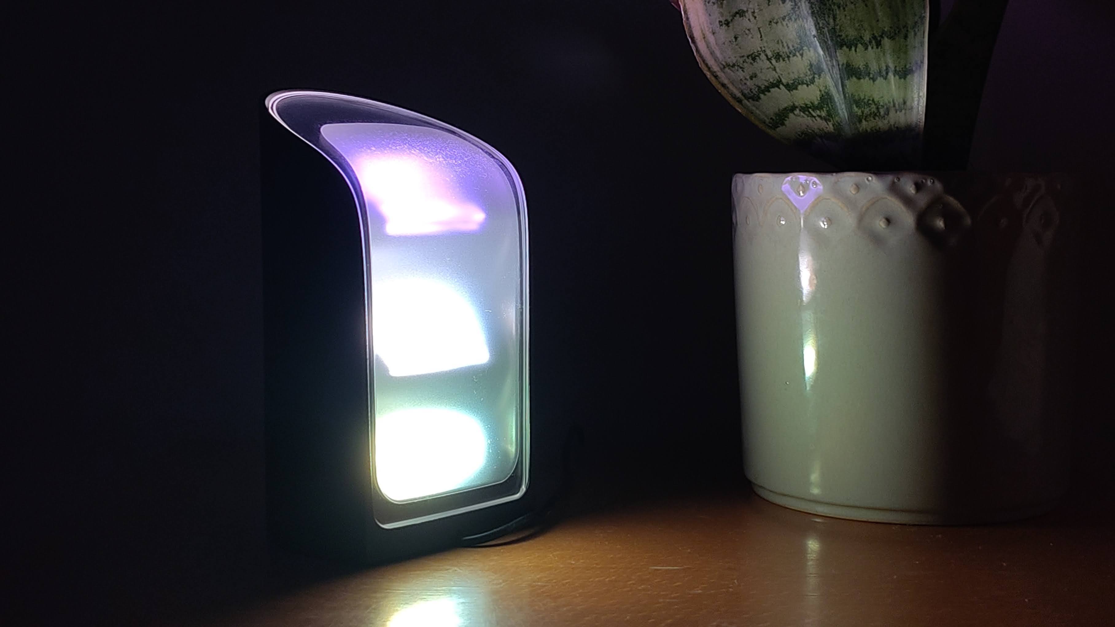Philips Hue Wall Washer in dark room, showing three lights on rear