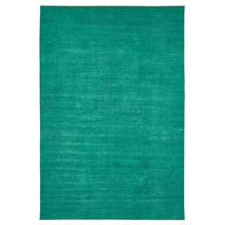 overdyed green rug on a white background