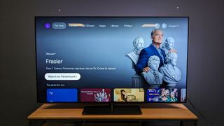 Philips OLED808 with Google TV home menu on screen