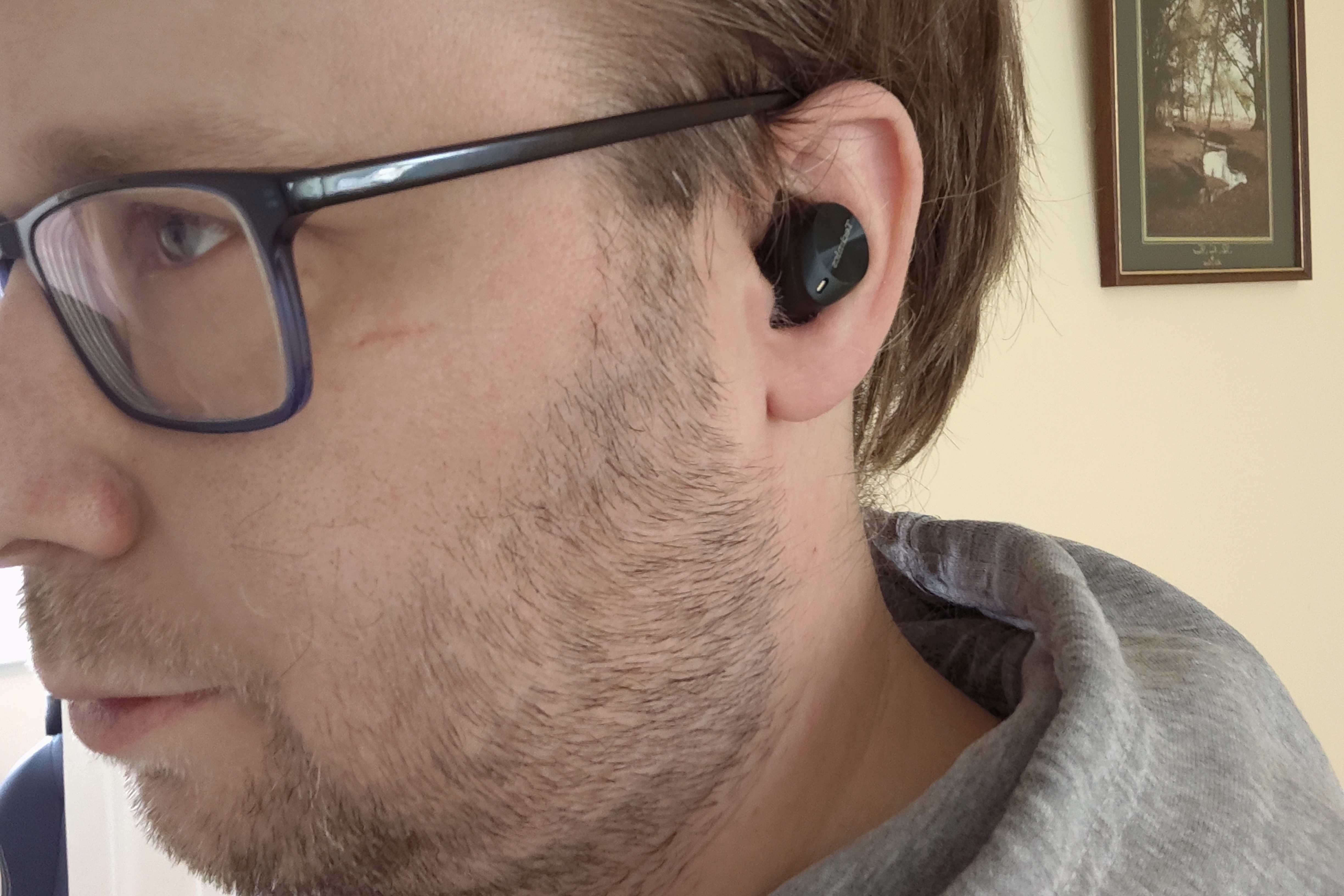 Panasonic Technics EAH-AZ80 earbuds being worn by a man