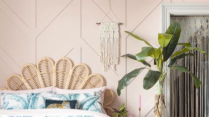 Rattan headboard in front of pink bedroom wall panelling ideas