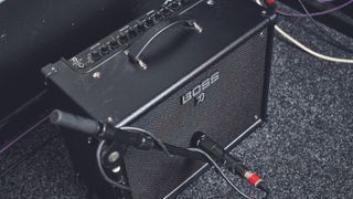 Boss Katana-50 MkII guitar amplifier with a microphone