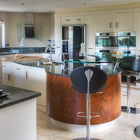 Kitchen with chairs and marble countertop