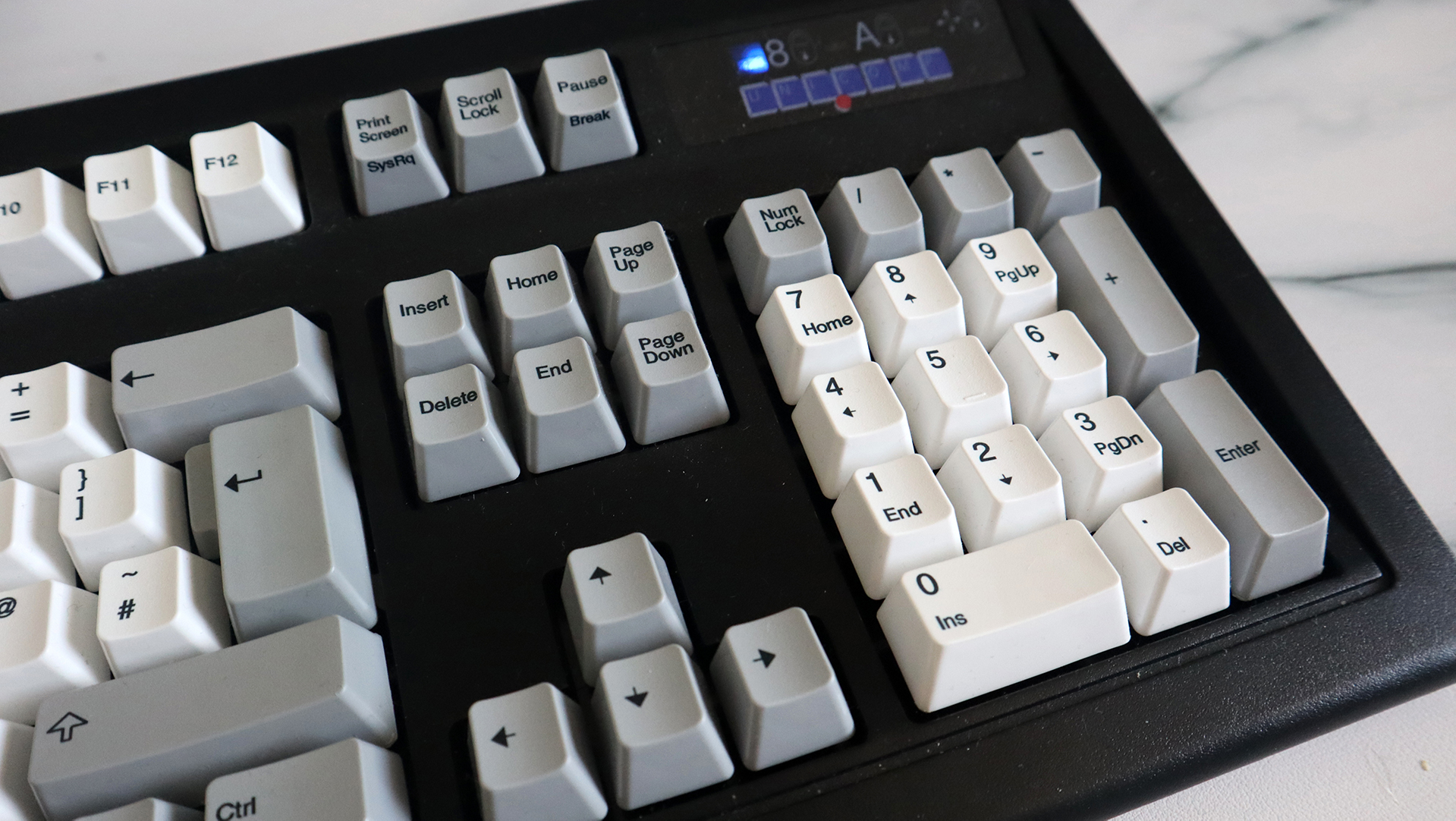 Unicomp New Model M keyboard on a countertop