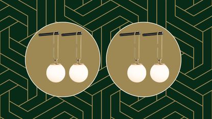 The Amazon wall sconces hanging from a black hook on a green and gold geometric background