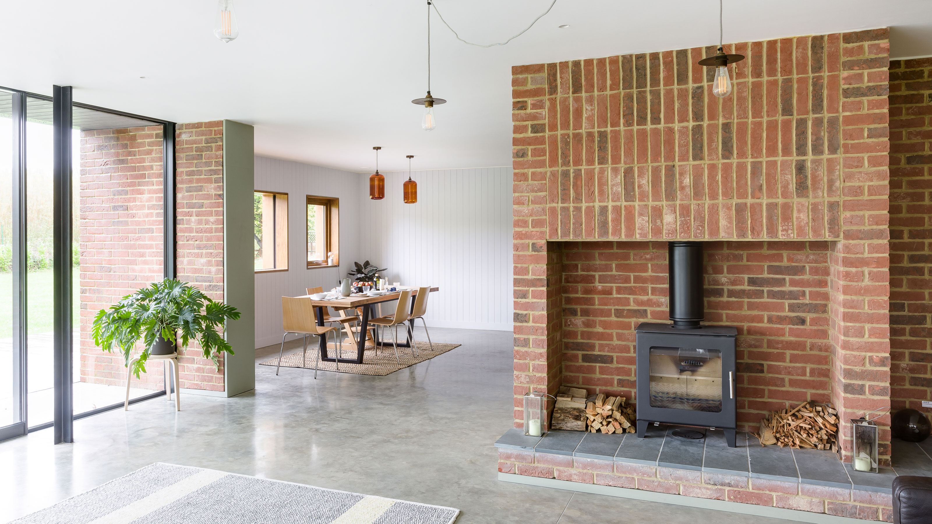 modern living room with brick fireplace